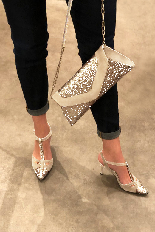 Dress T-strap closed-toe heels in gold and champagne white with high slim heels and tapered toe - Worn view